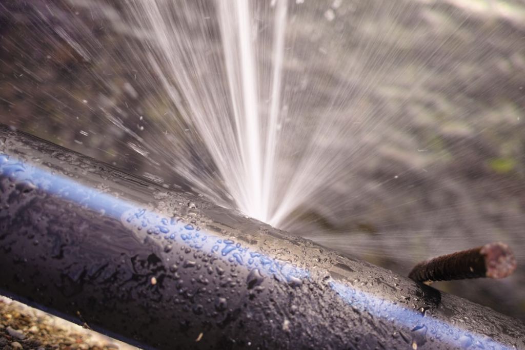 detail of burst water pipe in my town