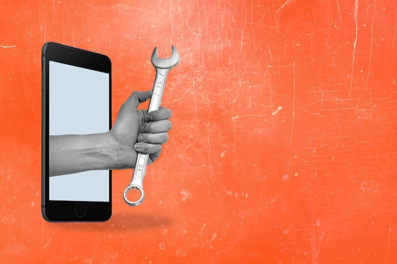 Art collage, phone and hand with a wrench, copy spice. Concept of technical support, guarantee service, repair.