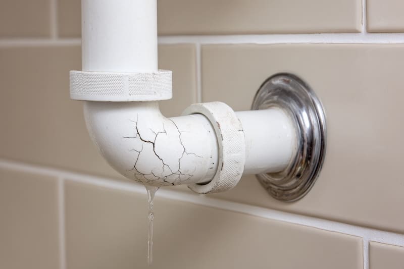 old PVC pipe with water escaping through a cracked connector, kitchen wall tiles --chaos 20 --ar 3:2 --profile 6wvx22l --v 7 Job ID: dd538ed2-c855-4899-b2f6-eea847595580 pressure regulator in a house