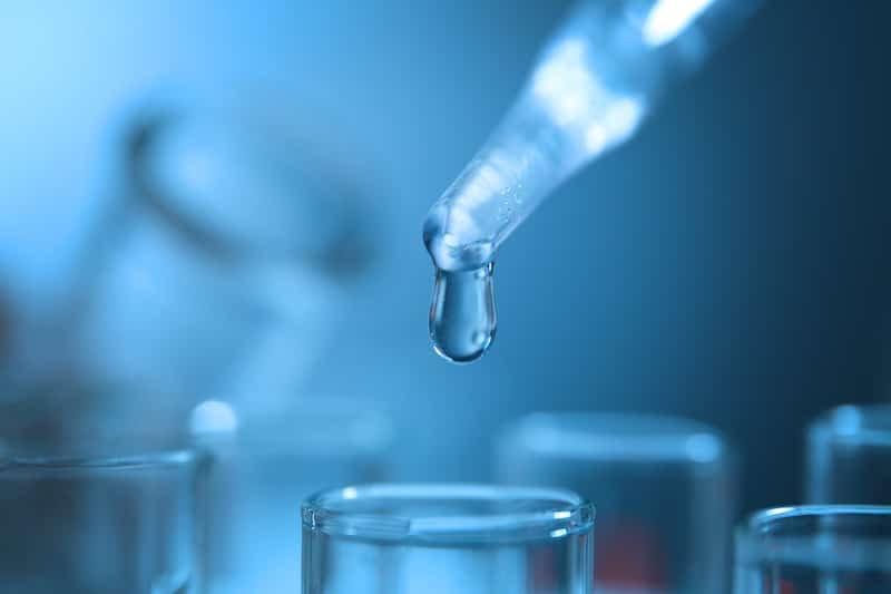 Testing water in laboratory closeup