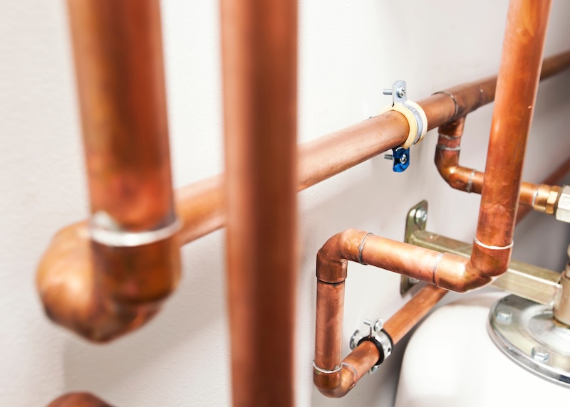A lot of copper pipes in the boiler-room